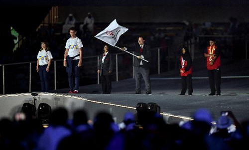 3月21日，第十五届世界夏季特殊奥林匹克运动会在阿联酋阿布扎比闭幕。图为特奥会会旗交接仪式（3月21日摄）。新华社记者夏一方摄